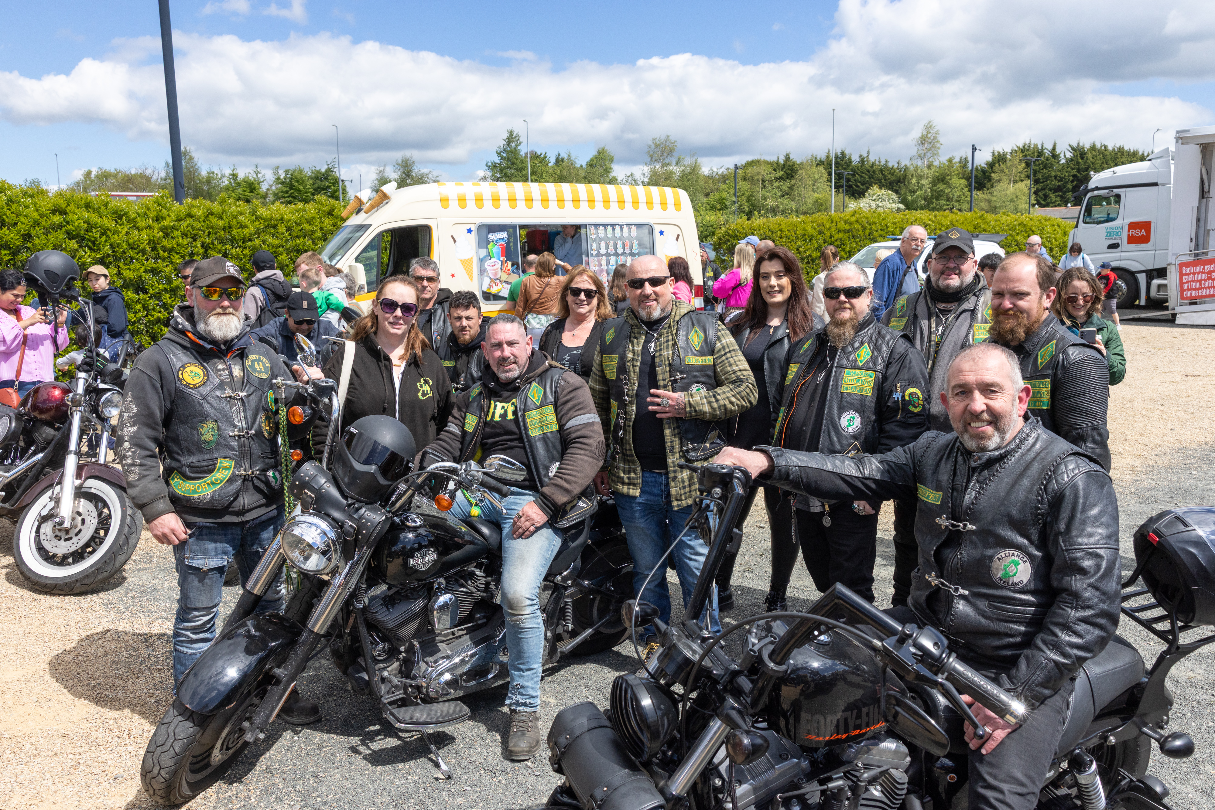 Biker group smiling.